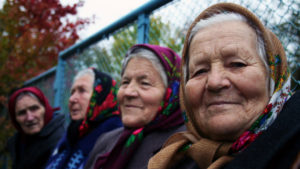 babushkas_group-in-front-of-fence